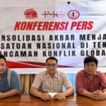 Konferensi Pers Imc Jihn Dan Komrad
